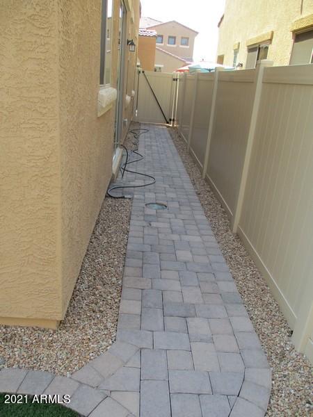 1367 South Country Club Drive, Unit 1153 Mesa, AZ 85210 - Photo 5 of 48 a view of a pathway