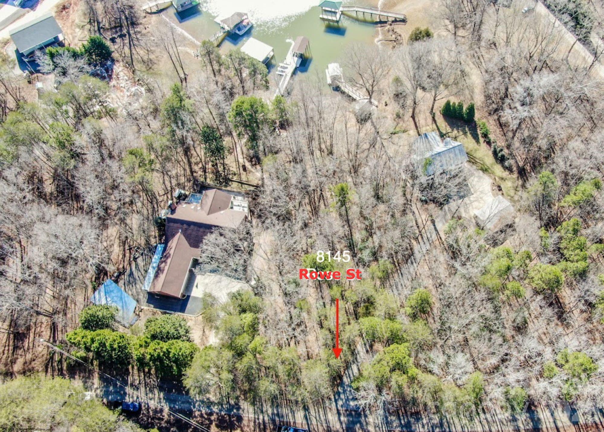 8145 Rowe Street Catawba, NC 28609 - Photo 9 of 9 an aerial view of a house with a yard and garden