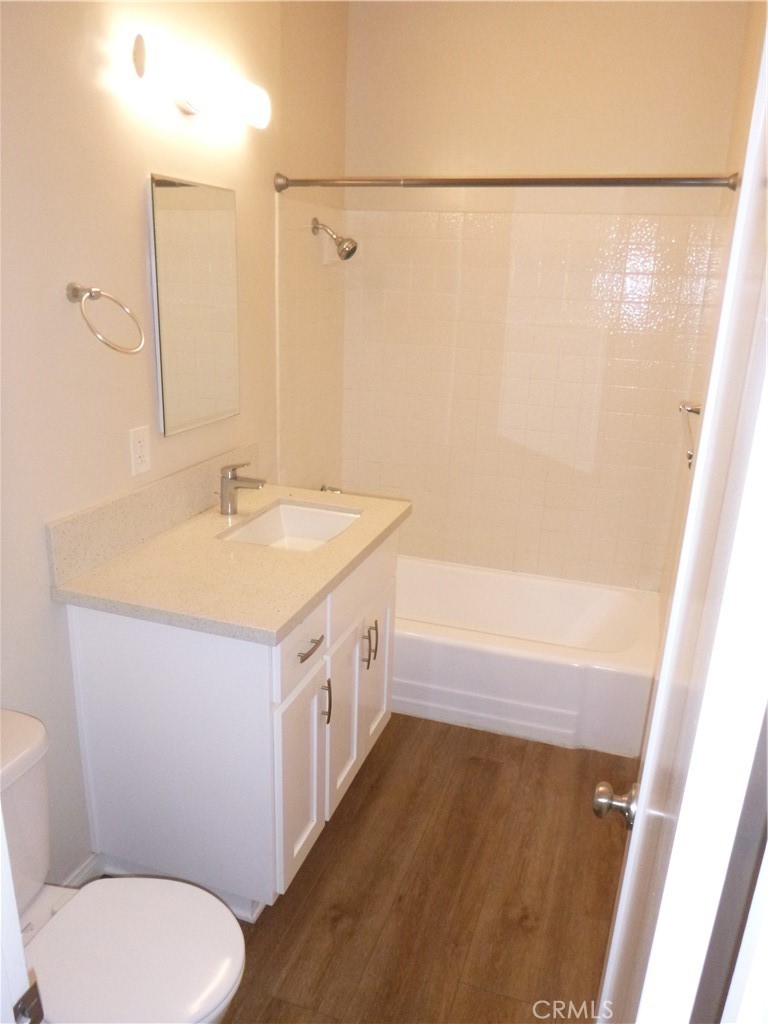 620 Prospect Avenue Long Beach, CA 90814 - Photo 11 of 11 a bathroom with a sink a toilet and a bathtub