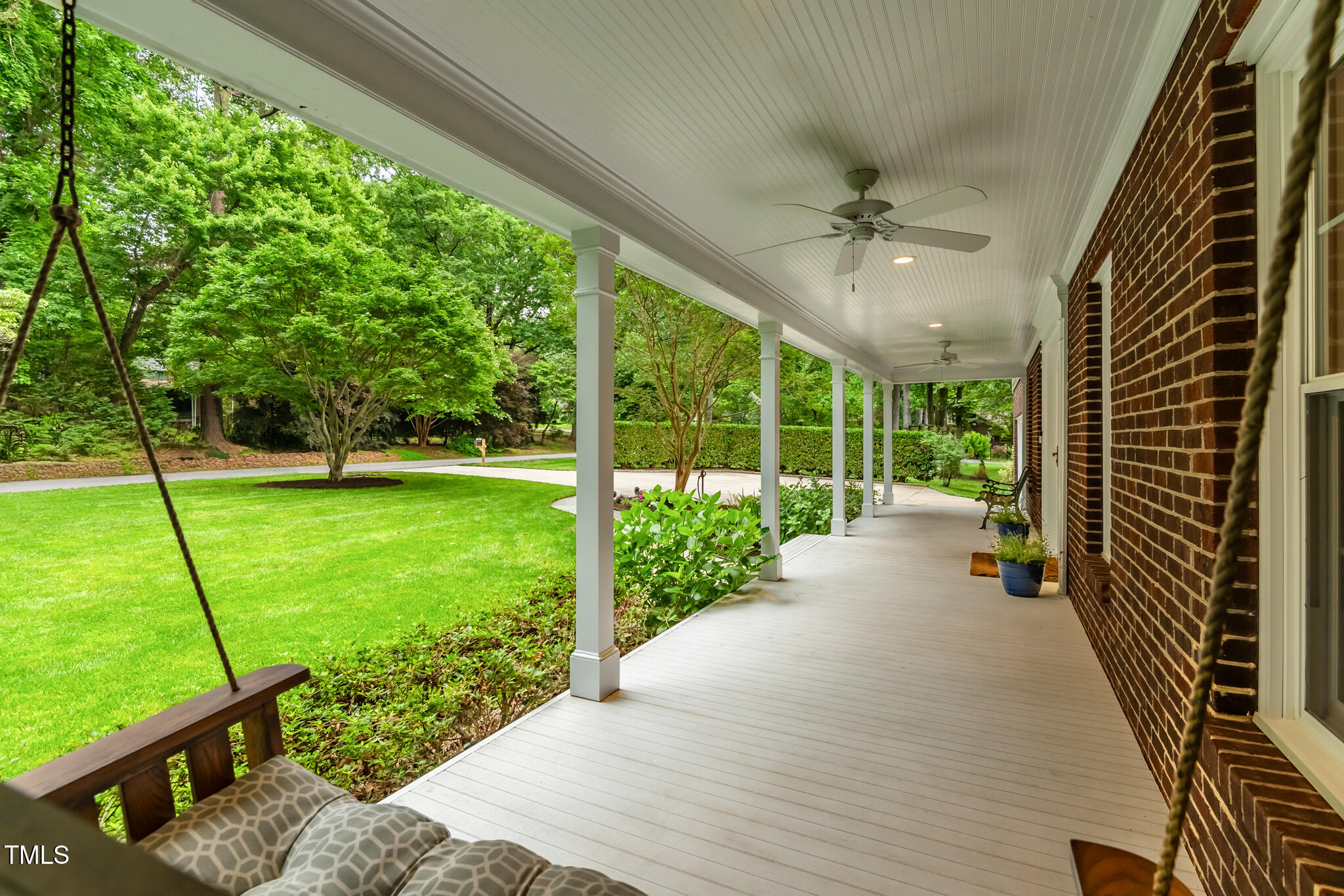 8608 Valley Brook Drive Raleigh, NC 27613 - Photo 8 of 74 a view of a garden with an outdoor seating