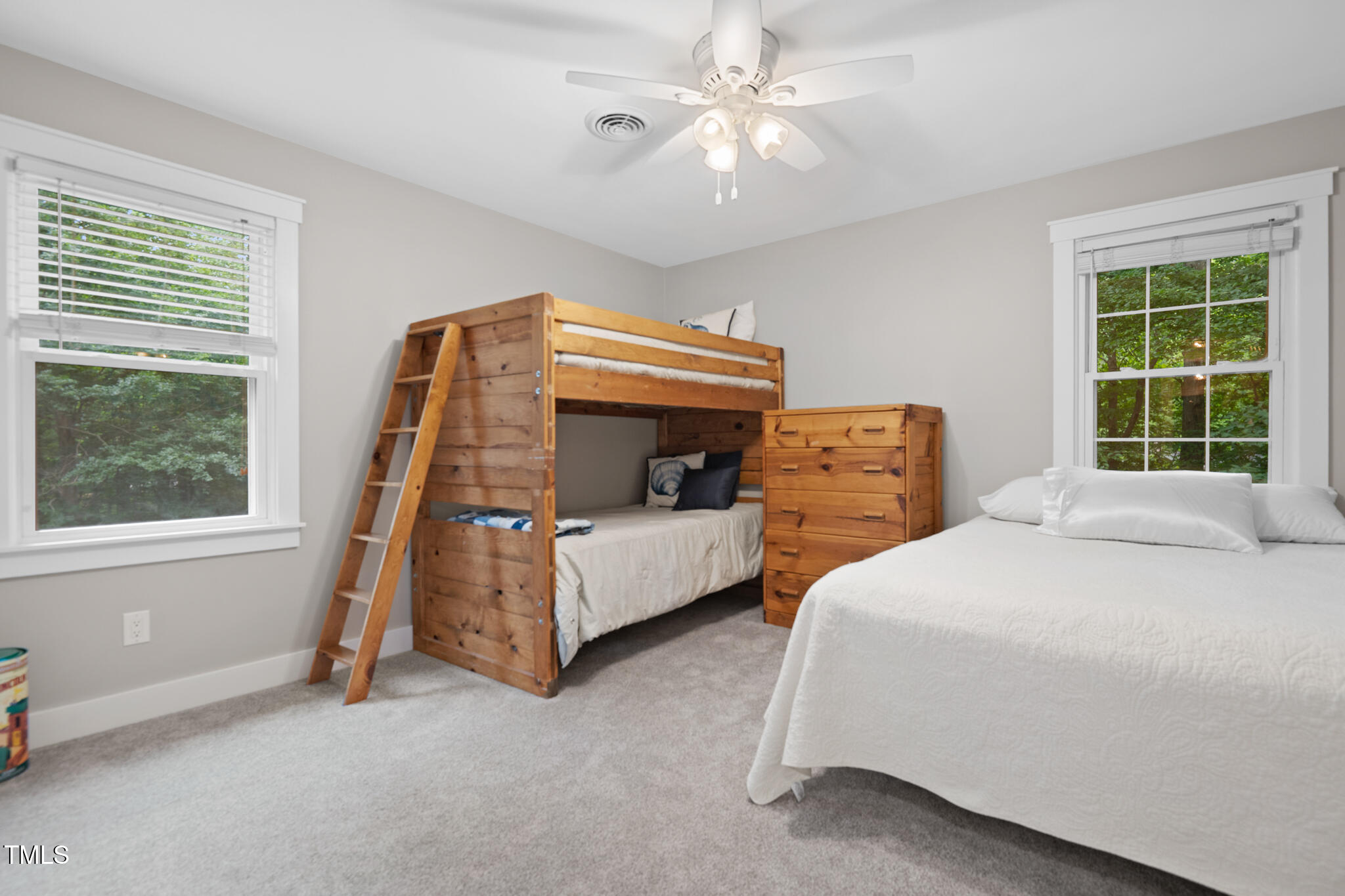 8608 Valley Brook Drive Raleigh, NC 27613 - Photo 38 of 74 a bedroom with bed and a window