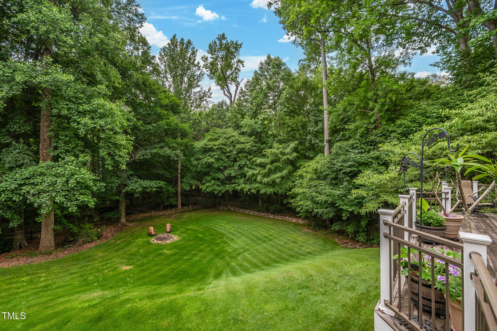 8608 Valley Brook Drive Raleigh, NC 27613 - Photo 60 of 74 a view of a backyard with a garden