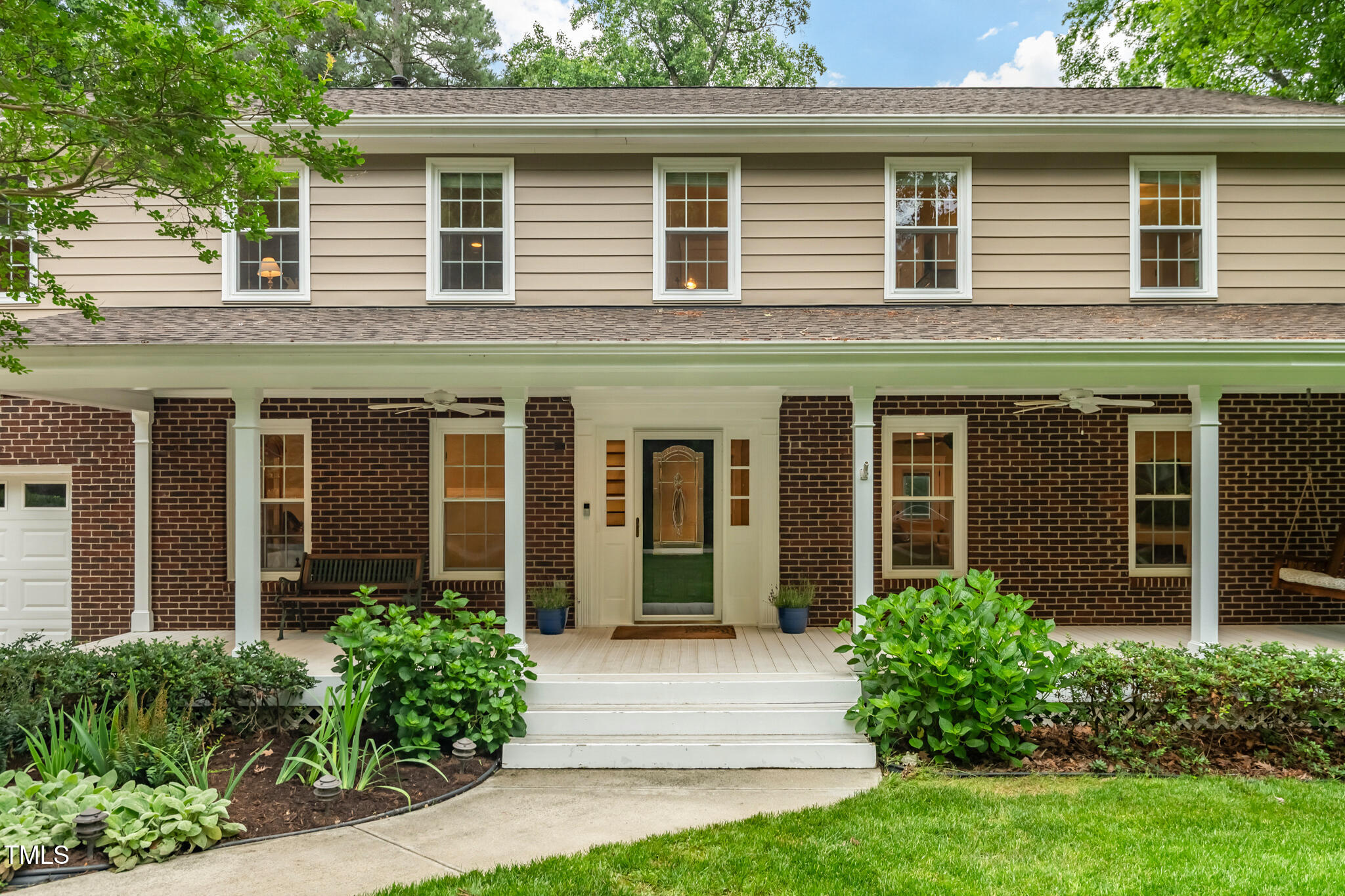 8608 Valley Brook Drive Raleigh, NC 27613 - Photo 5 of 74 front view of a brick house