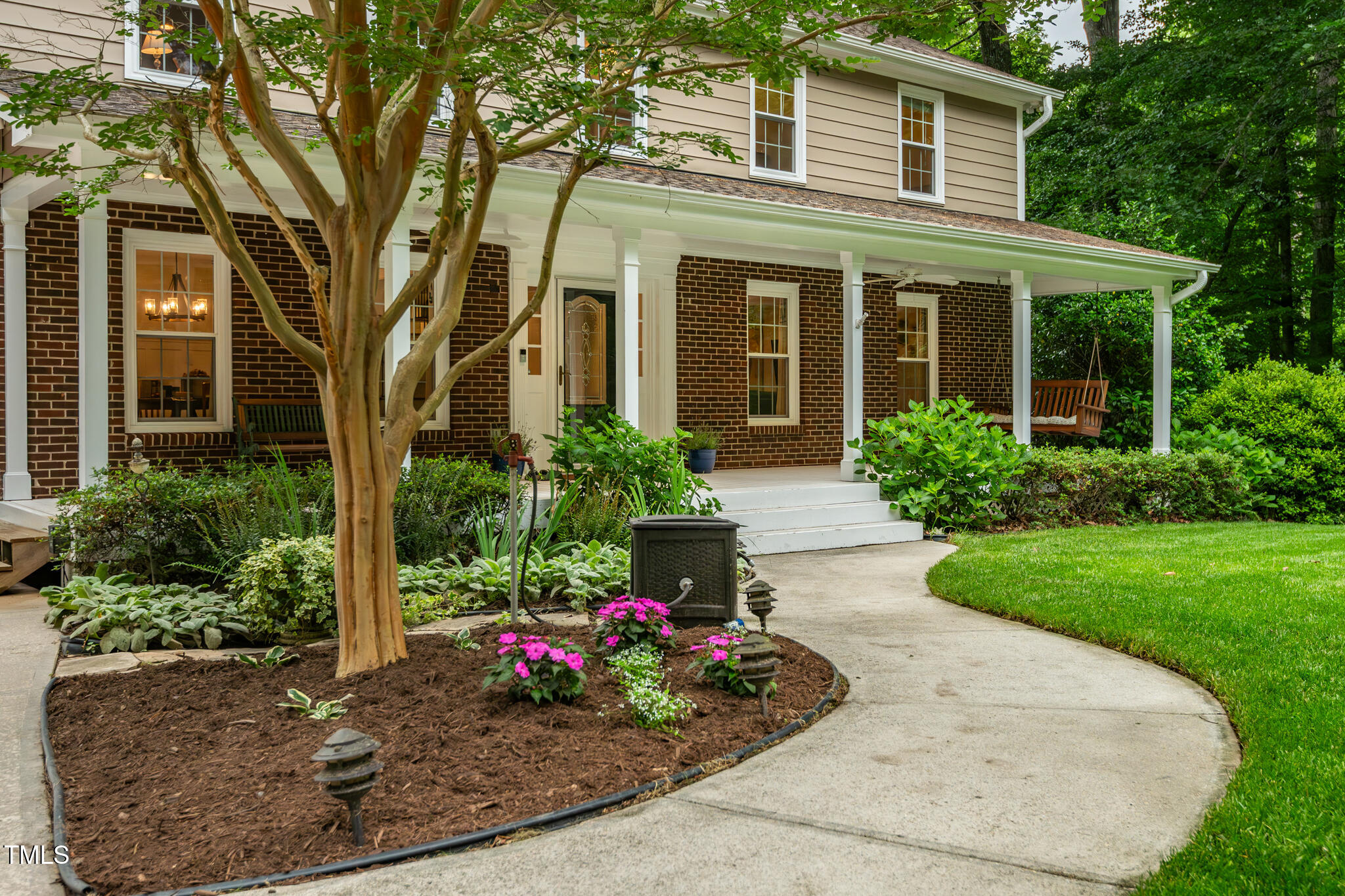 8608 Valley Brook Drive Raleigh, NC 27613 - Photo 6 of 74 front view of a house with a yard