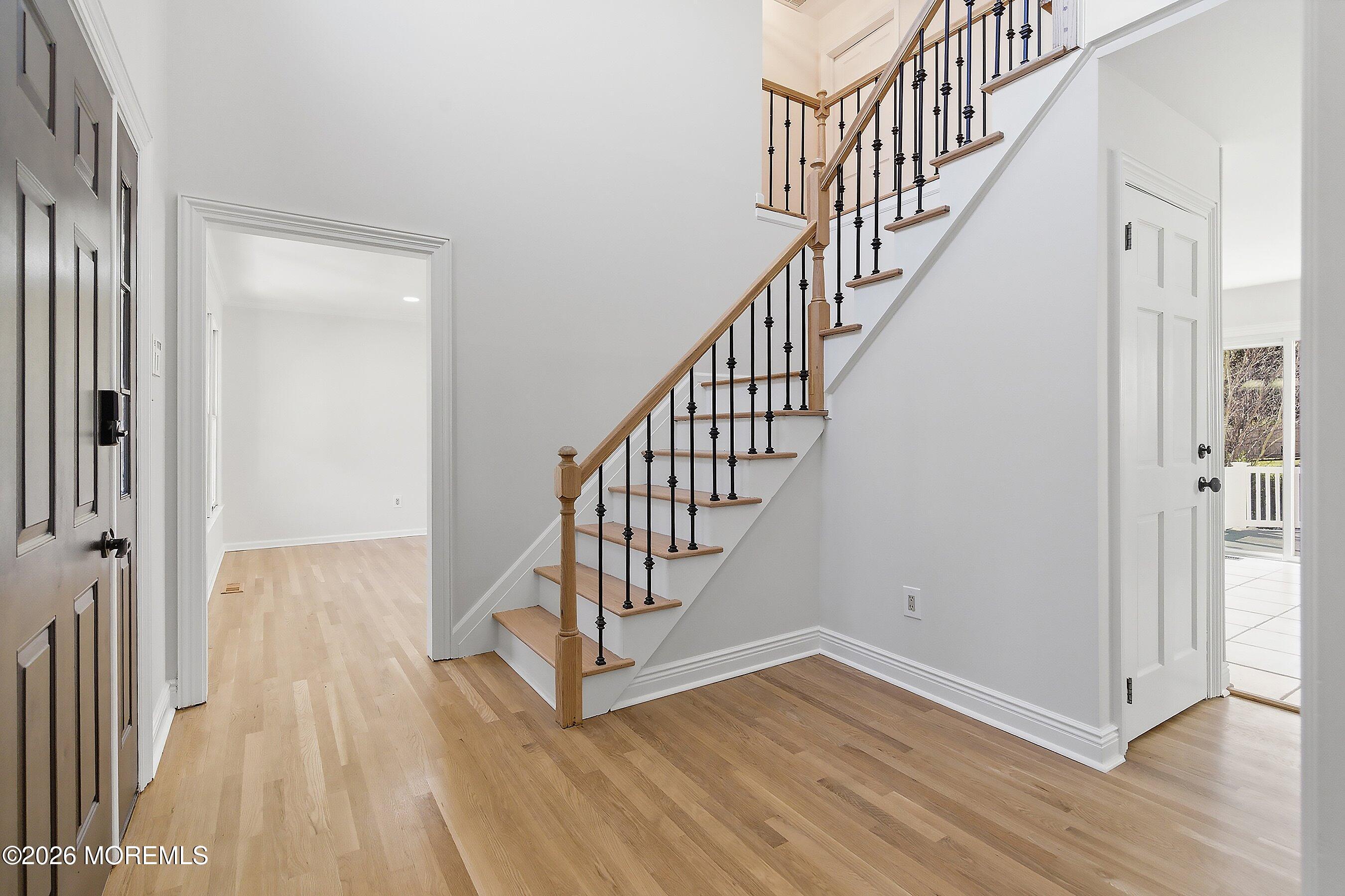 7 Shire Way Middletown, NJ 07748 - Photo 24 of 61 a view of entryway with wooden floor