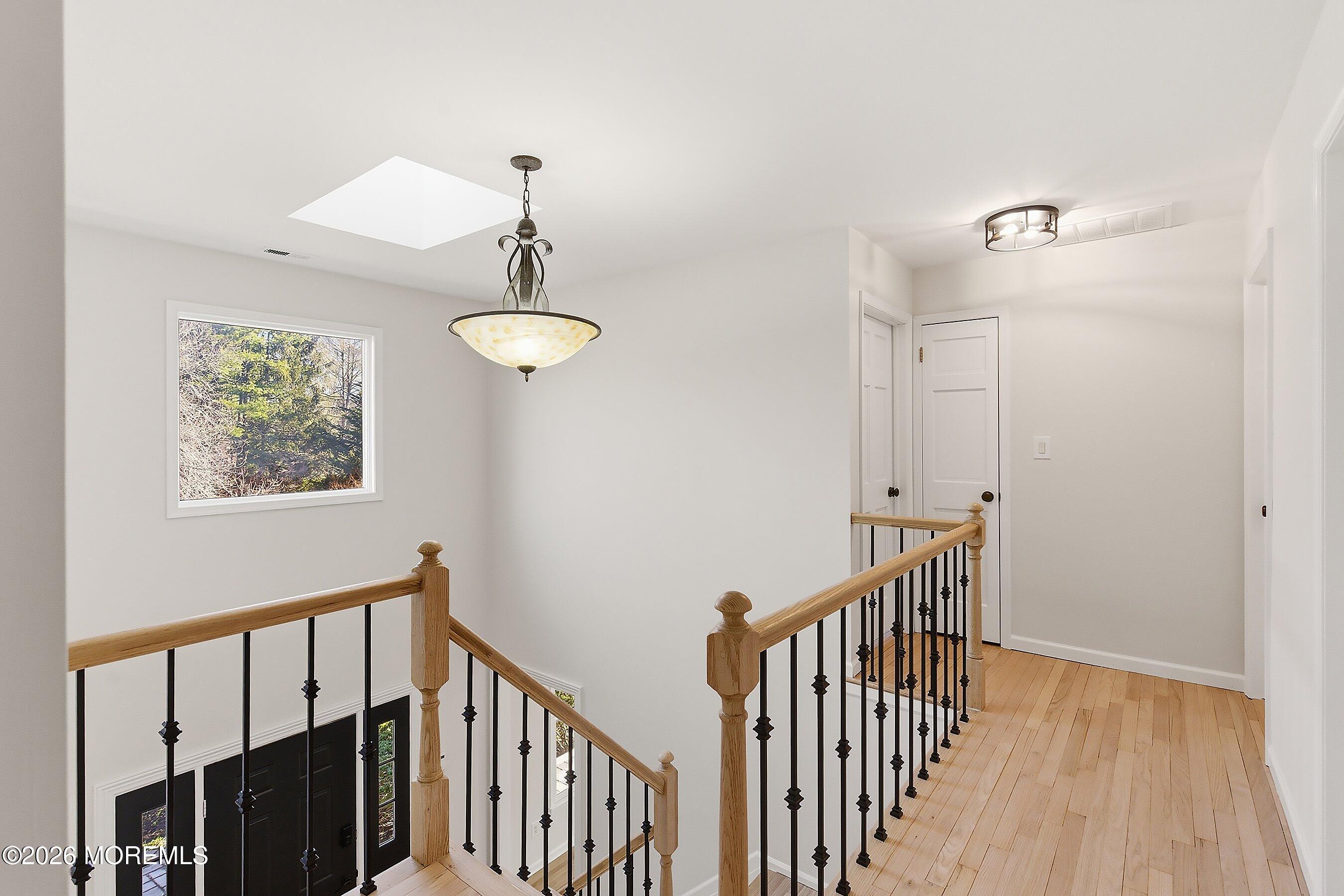 7 Shire Way Middletown, NJ 07748 - Photo 27 of 61 a view of a hallway with windows and stairs