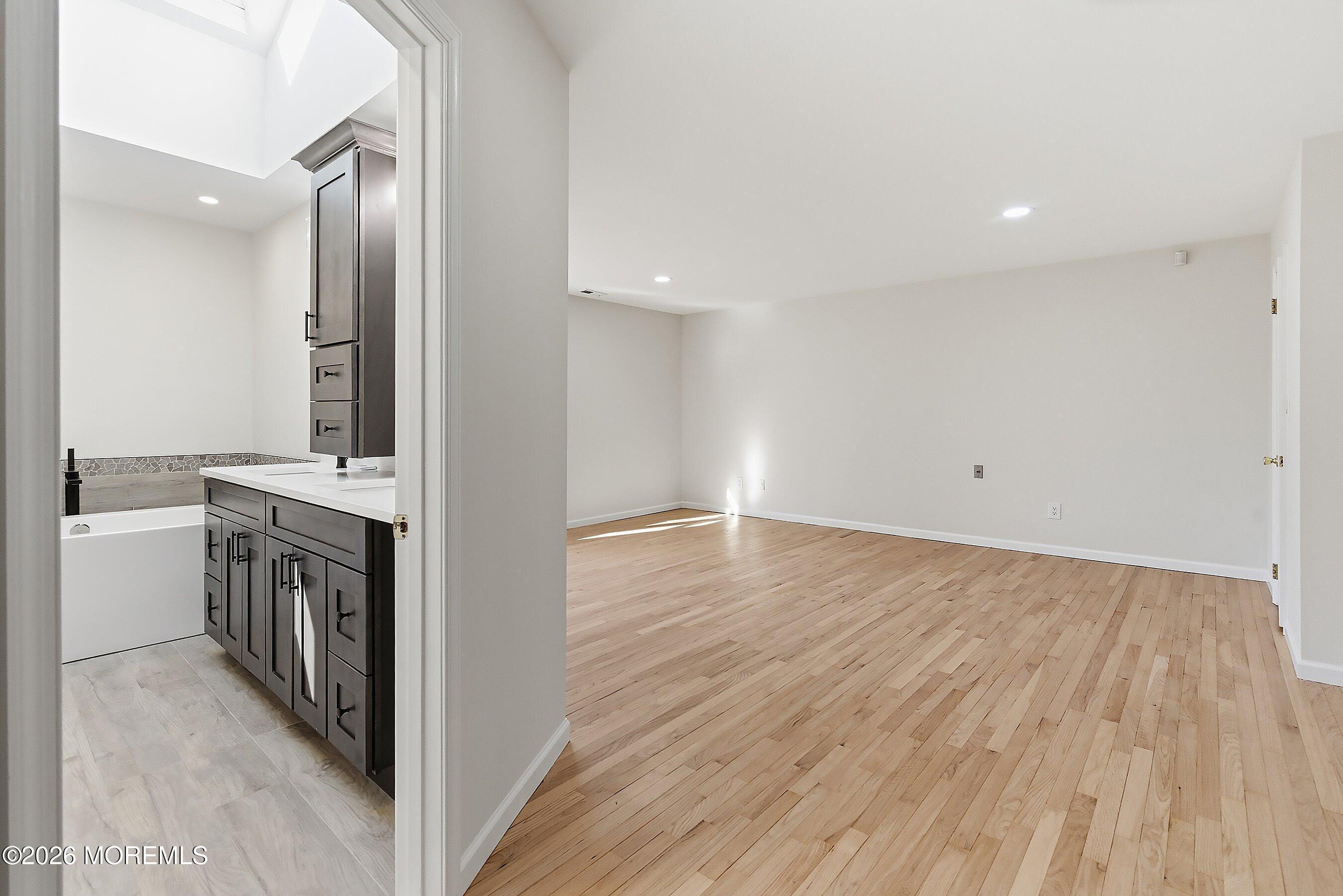 7 Shire Way Middletown, NJ 07748 - Photo 29 of 61 a view of a kitchen cabinets a sink and wooden floor