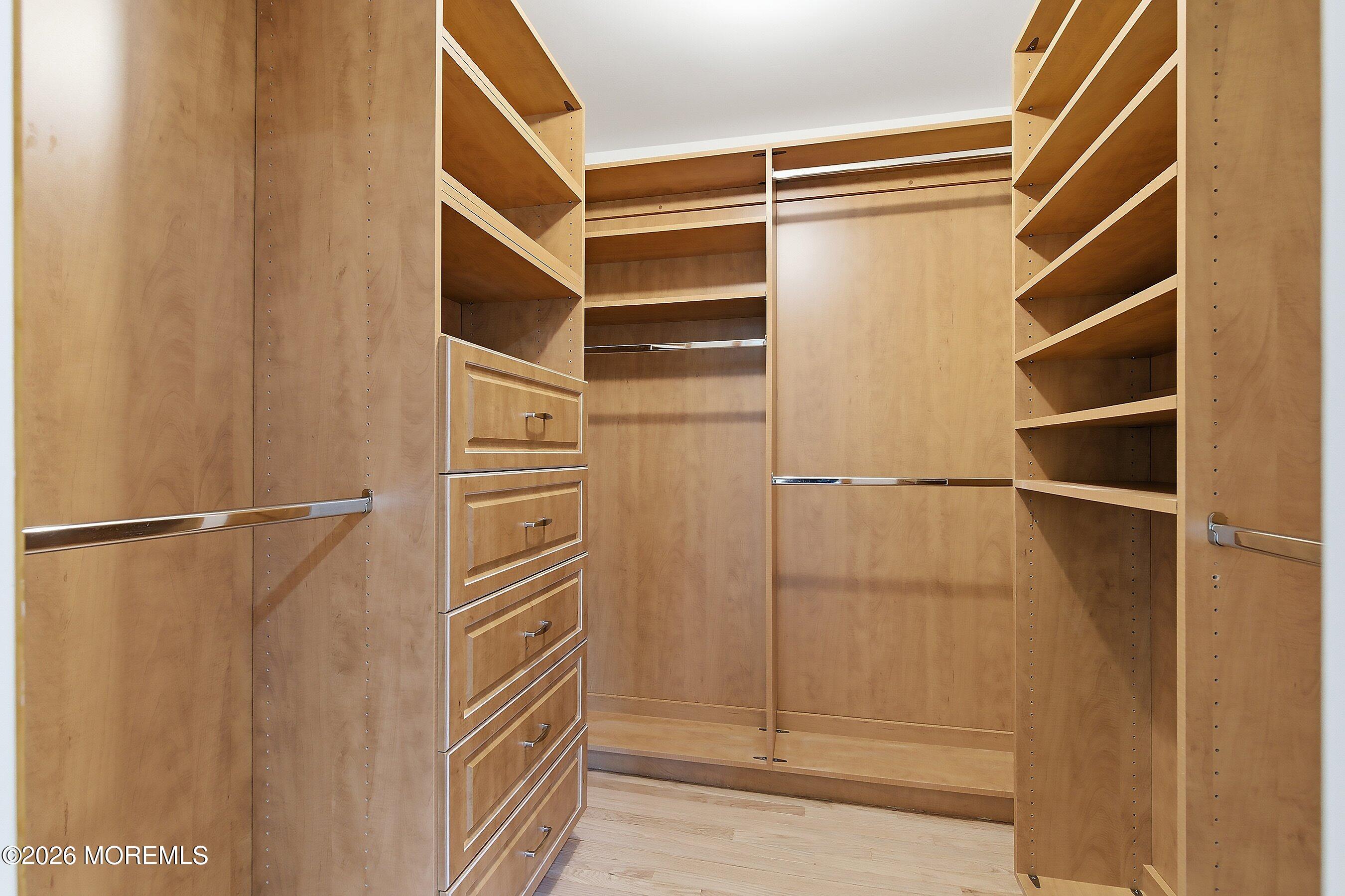 7 Shire Way Middletown, NJ 07748 - Photo 34 of 61 a view of walk in closet with empty racks