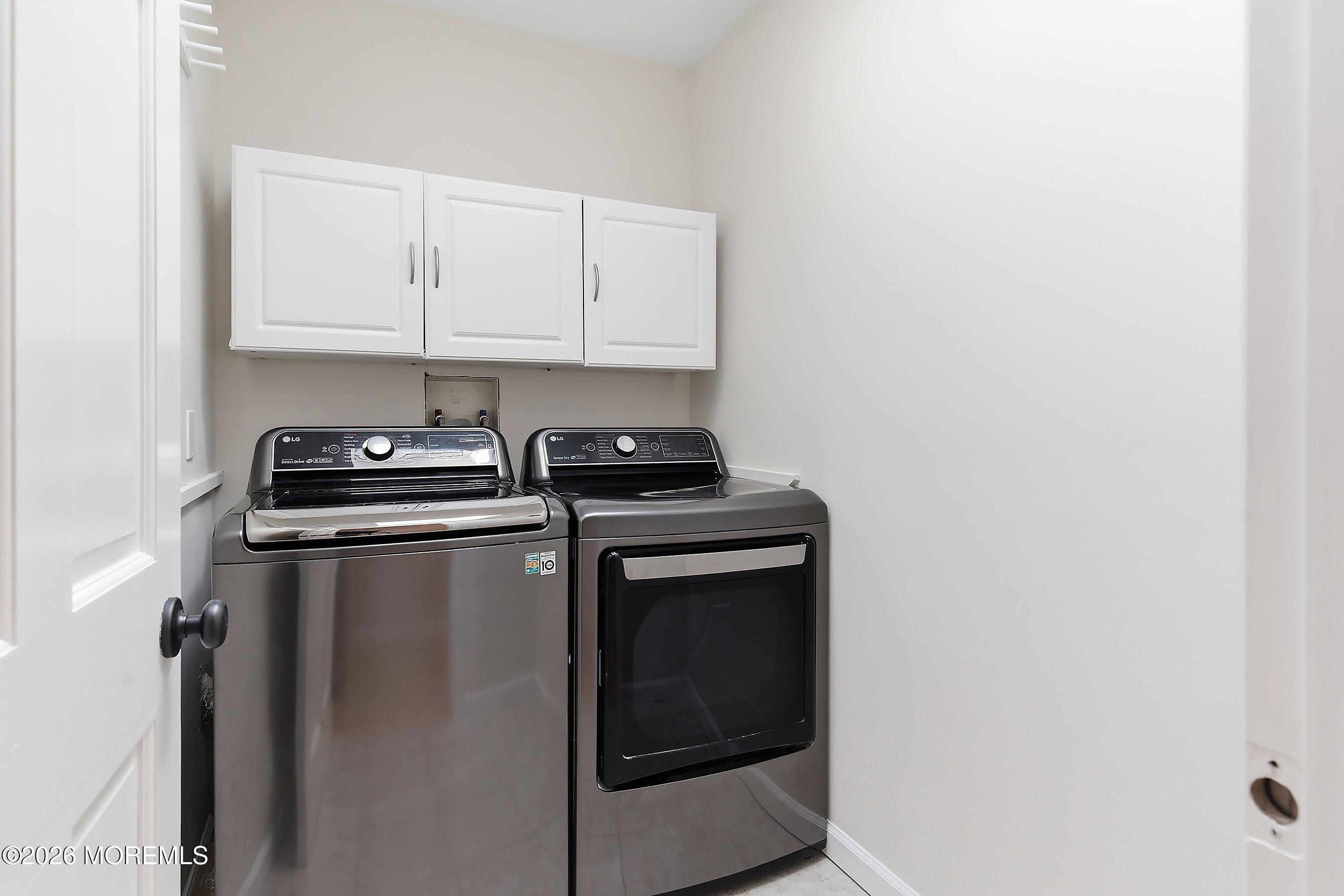 7 Shire Way Middletown, NJ 07748 - Photo 42 of 61 a close up view of washer and dryer