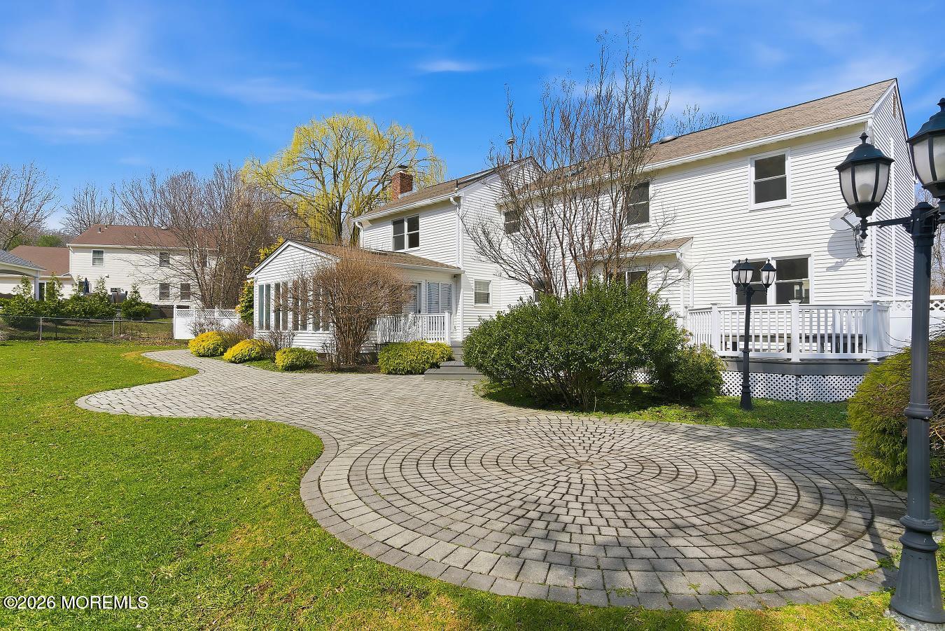 7 Shire Way Middletown, NJ 07748 - Photo 55 of 61 a front view of a house with garden