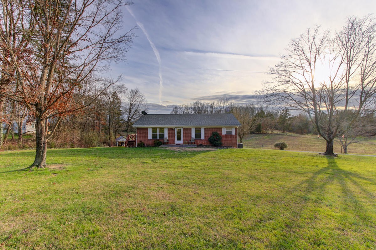 10704 Mountain Road Luttrell, TN 37779 - Photo 1 of 25 a view of a house with a yard