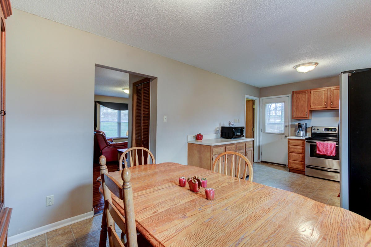 10704 Mountain Road Luttrell, TN 37779 - Photo 11 of 25 a bedroom with furniture and a wooden floor
