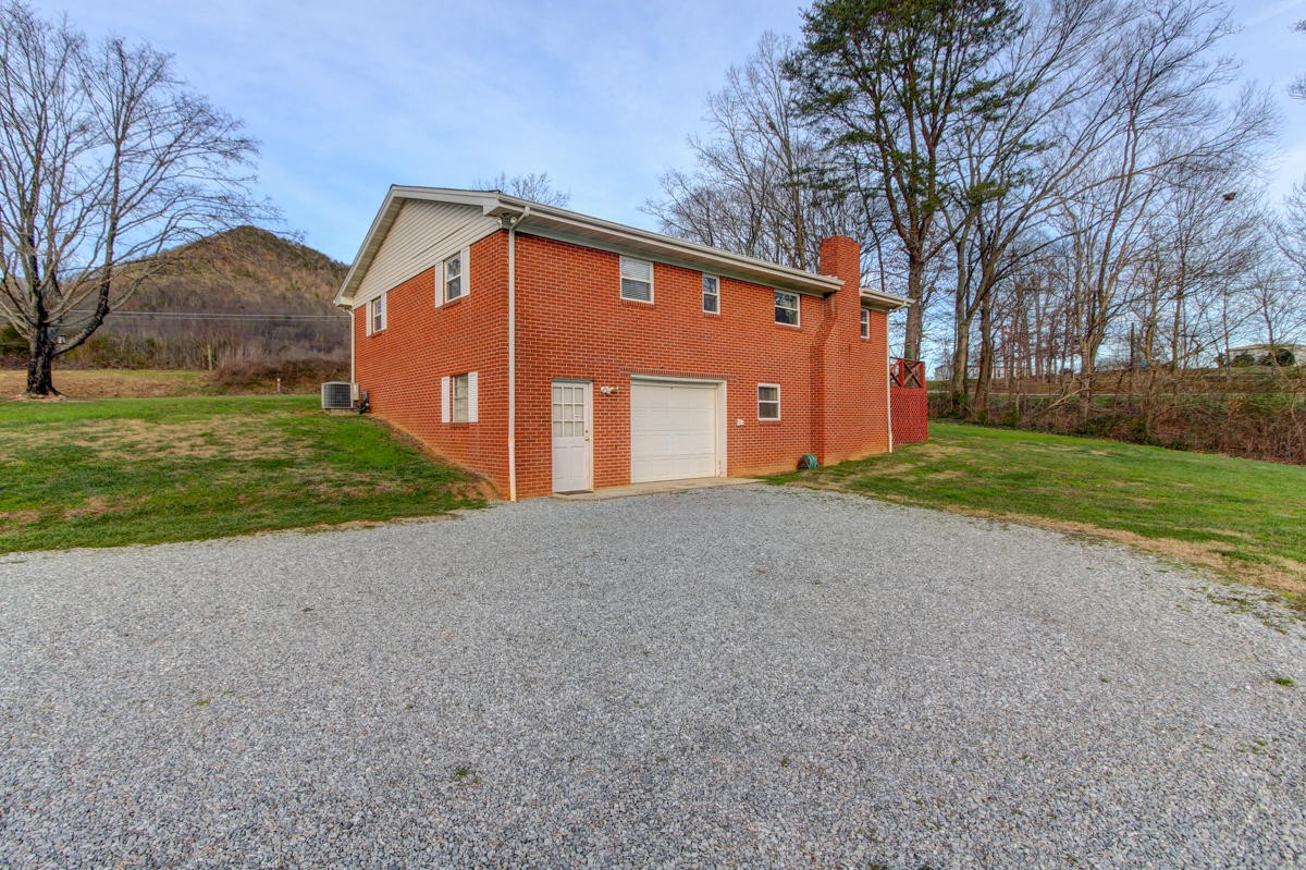 10704 Mountain Road Luttrell, TN 37779 - Photo 25 of 25 a view of a house with a yard
