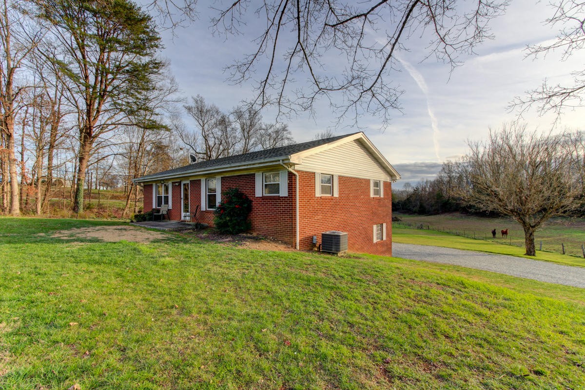 10704 Mountain Road Luttrell, TN 37779 - Photo 3 of 25 a view of a yard in front of house