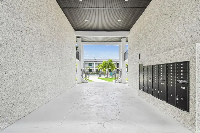 a view of a house with a yard porch and sitting area