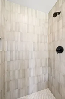 a bathroom with a shower curtain