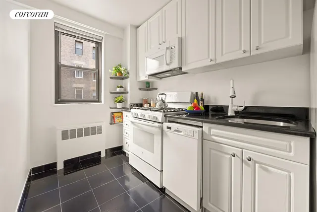 a living room with furniture or couch and a wooden floor