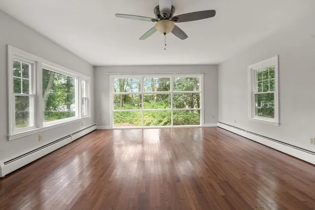 a view of room window and wooden floor