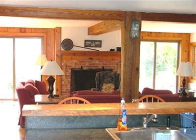 73 Dyer Prince Road Eastham, MA 02642 - Photo 8 of 21 a view of living room with furniture and a fireplace