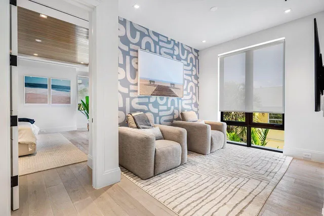 a living room with furniture and a table