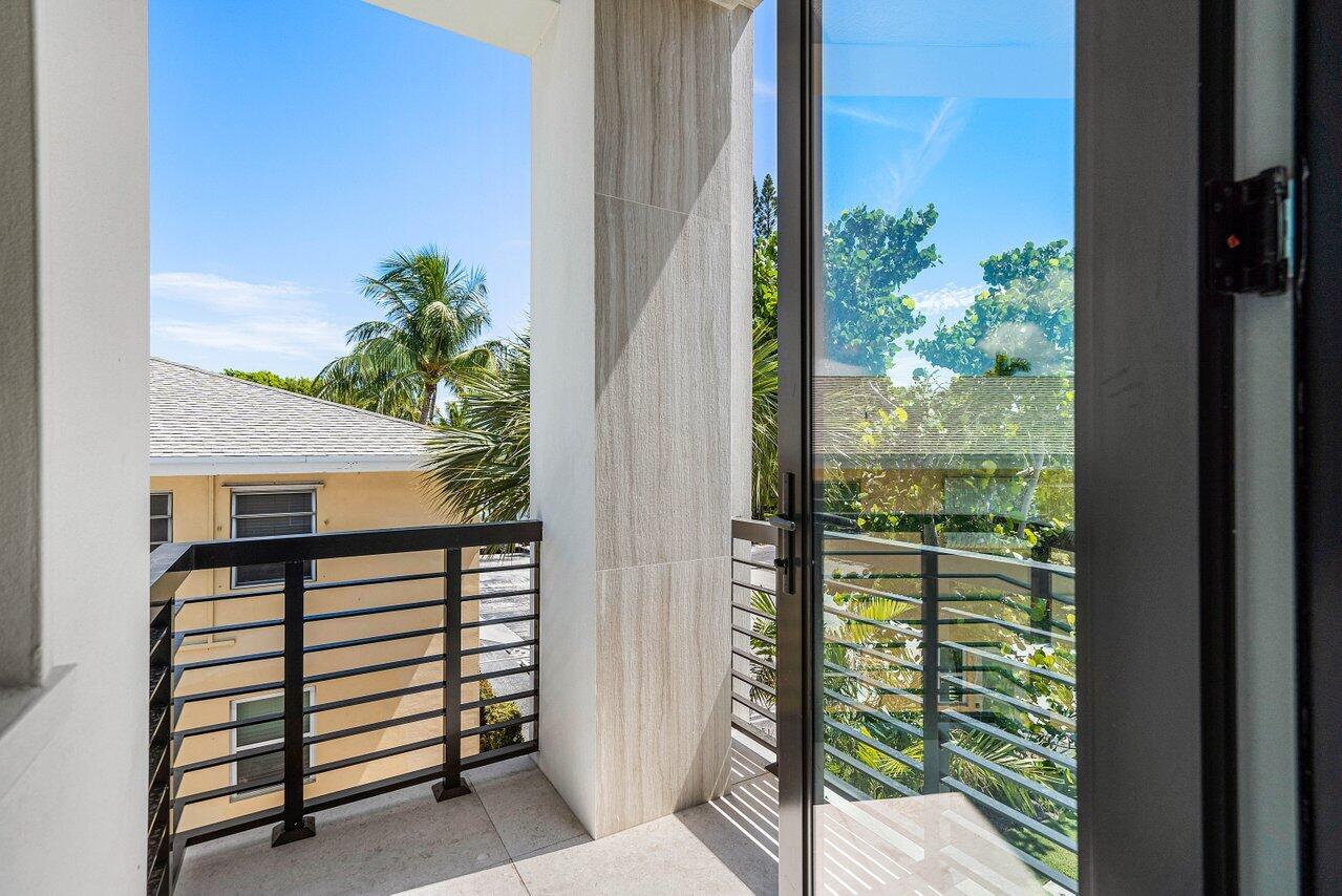 514 Northeast 7th Avenue Delray Beach, FL 33483 - Photo 35 of 51 a view of a balcony with plants
