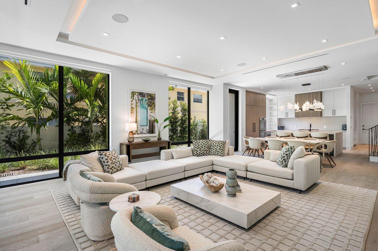 514 Northeast 7th Avenue Delray Beach, FL 33483 - Photo 6 of 51 a living room with furniture and a large window