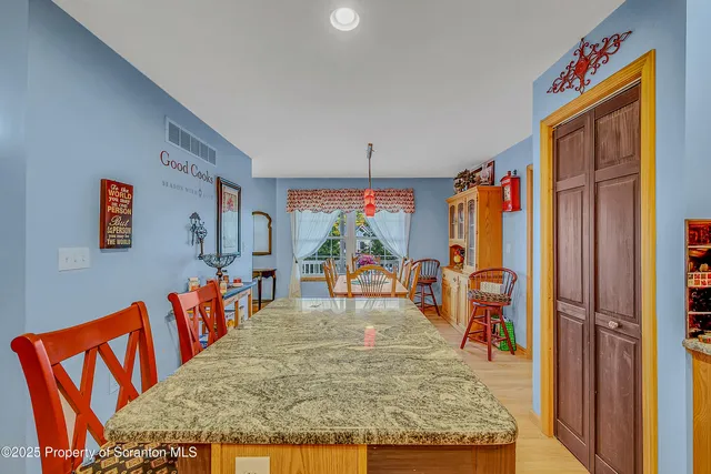 a view of a living room and dining room