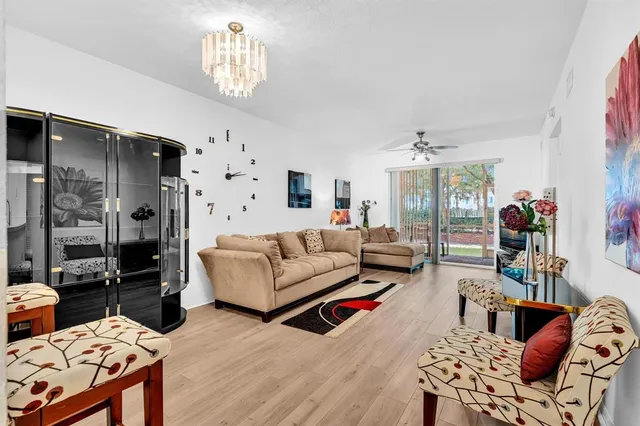 a bathroom with a glass shower door and a sink