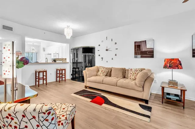 a white toilet sitting next to a bathroom