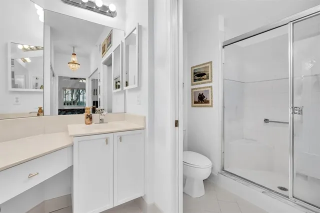 a couple of chairs sitting in front of a yard