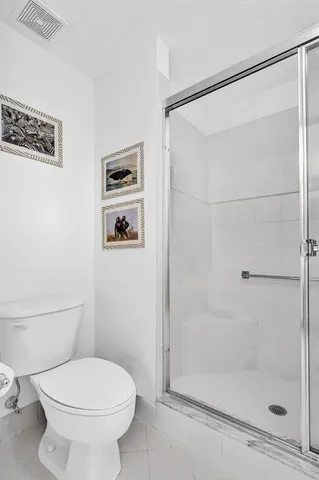 a view of a balcony with chair and table