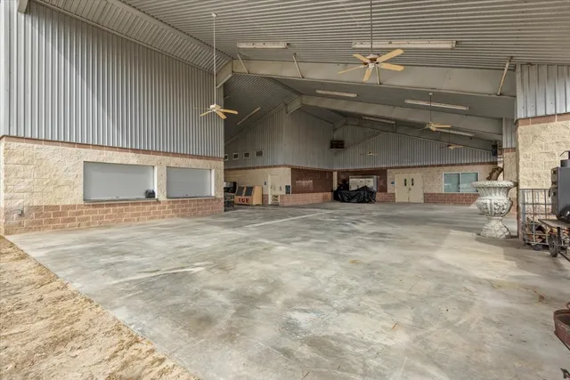 a view of a car park in front of house