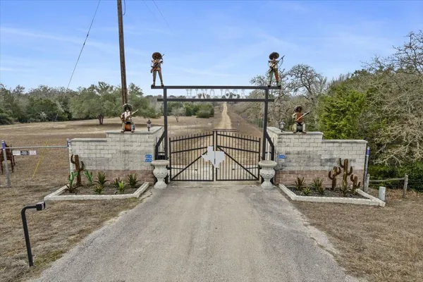 a view of a lake with a yard