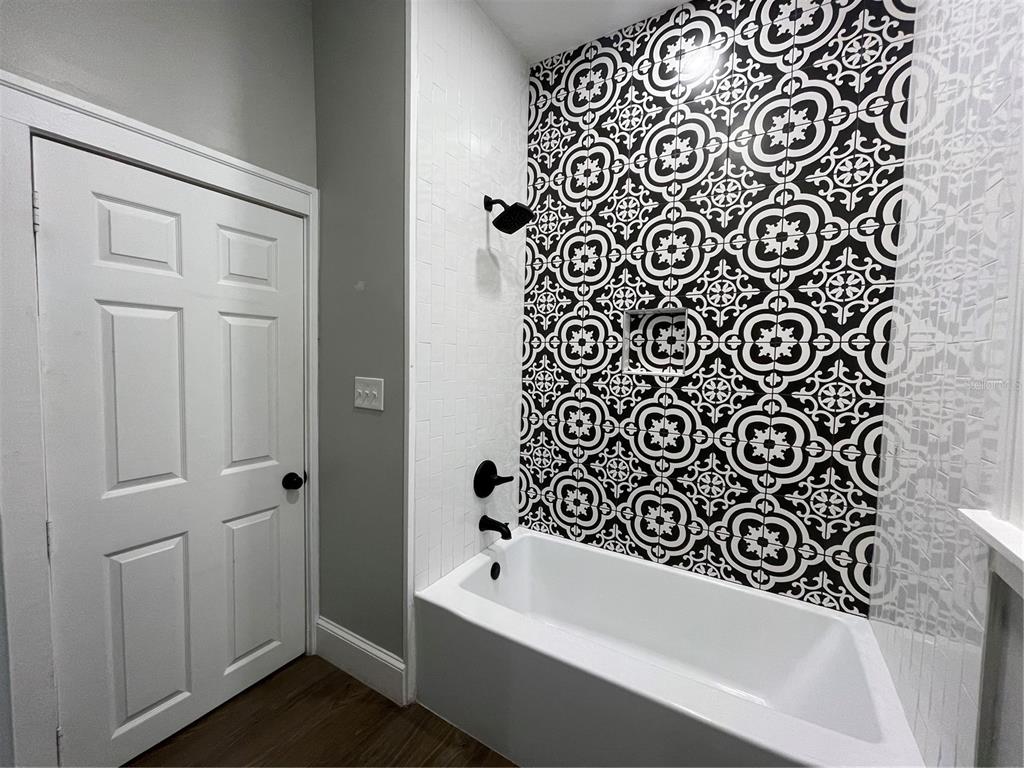 1932 West Spruce Street Tampa, FL 33607 - Photo 19 of 24 a bathroom with a bathtub and shower