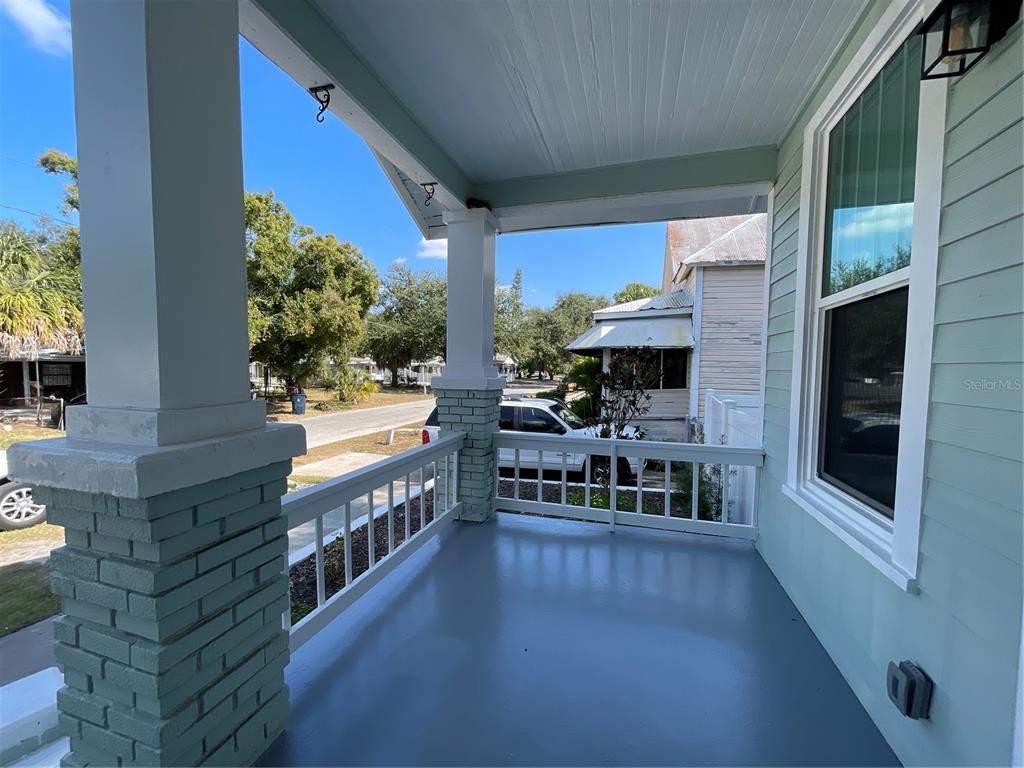 1932 West Spruce Street Tampa, FL 33607 - Photo 2 of 24 a view of a living room and balcony