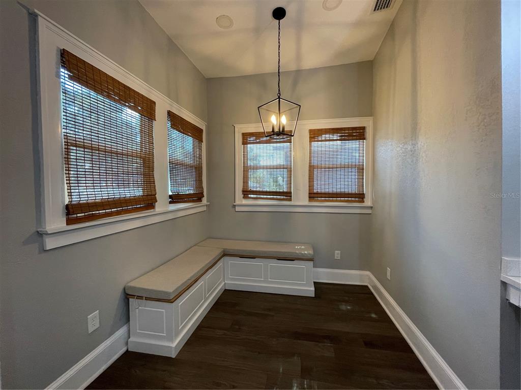1932 West Spruce Street Tampa, FL 33607 - Photo 7 of 24 a view of entryway and hall with wooden floor