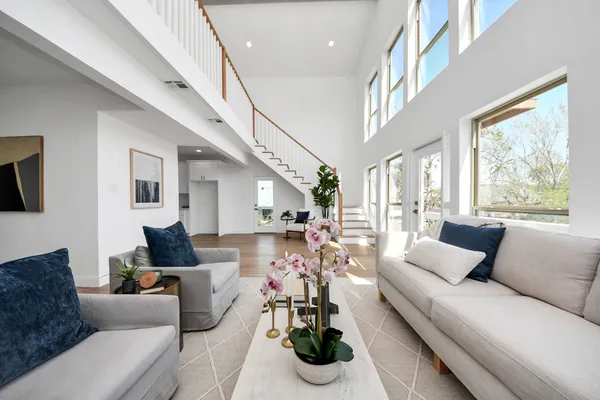 a view of an entryway with wooden floor and windows