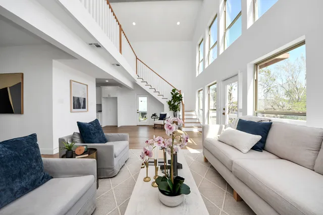 a view of an entryway with wooden floor and windows