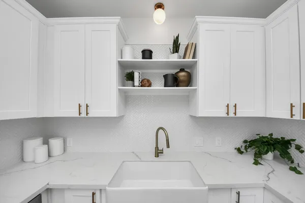 a living room filled with furniture window and wooden floor