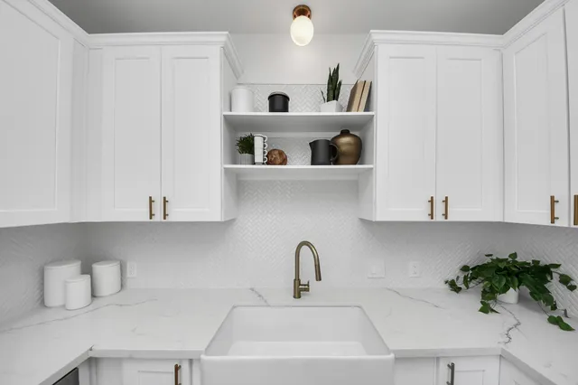 a living room filled with furniture window and wooden floor