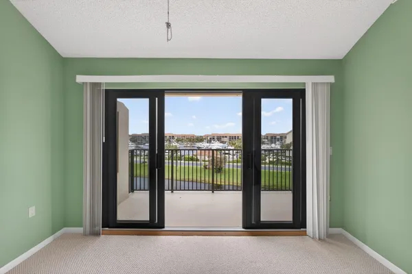 a room with sliding glass door
