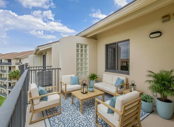 a building outdoor space with patio furniture