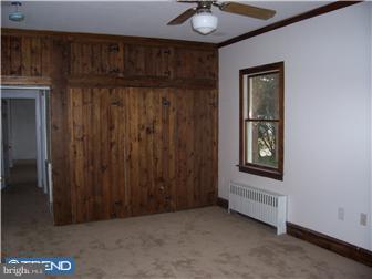 211 Dickinson Road Glassboro, NJ 08028 - Photo 6 of 10 an empty room with windows