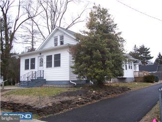 211 Dickinson Road Glassboro, NJ 08028 - Photo 10 of 10 a house that has tree in front of it
