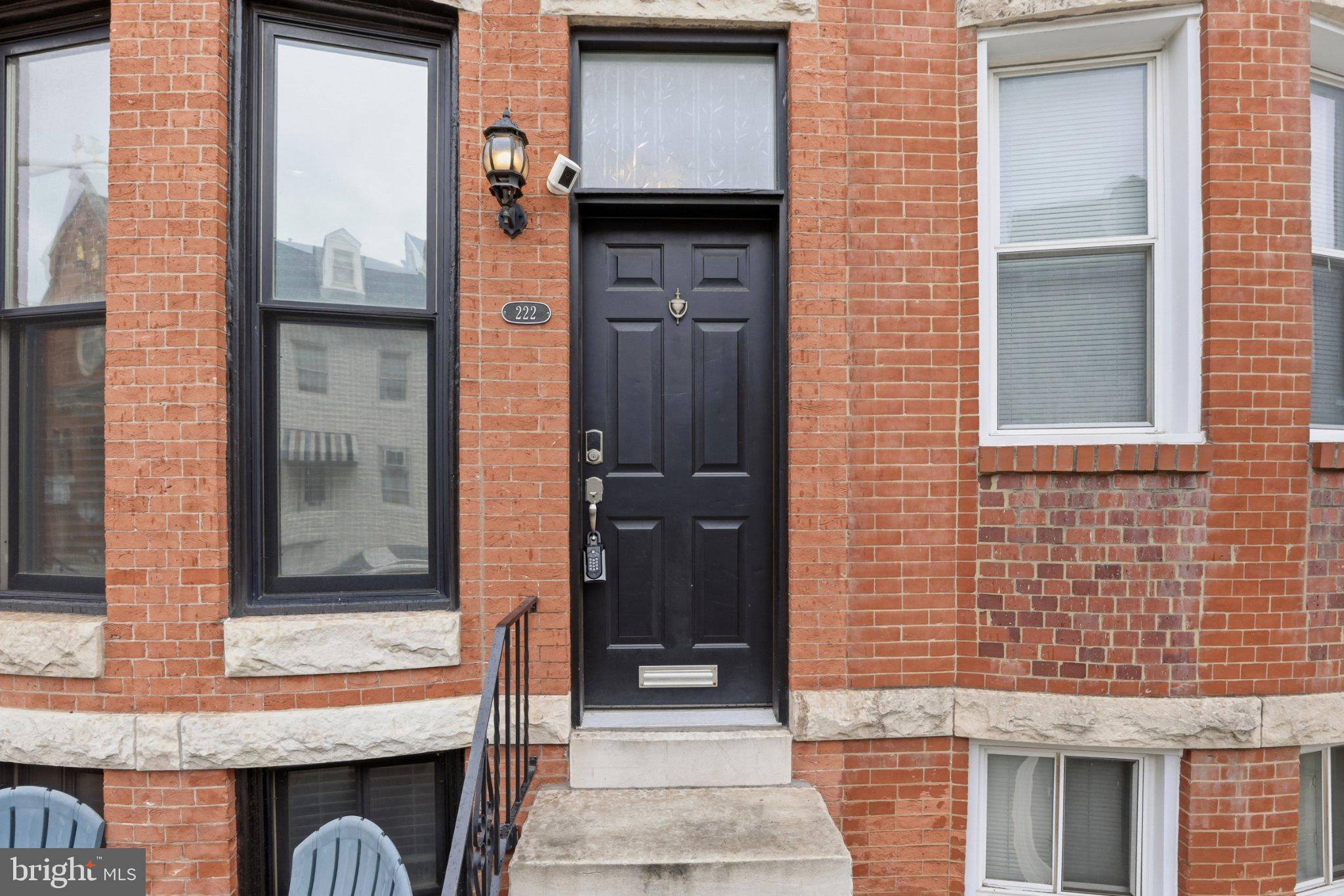 222 South Exeter Street Baltimore, MD 21202 - Photo 2 of 41 a front view of a house with windows