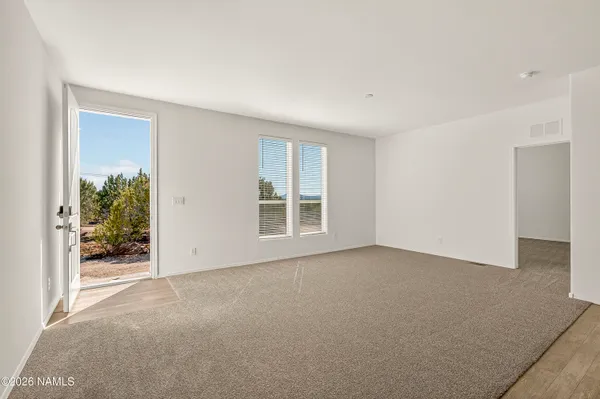 an empty room with windows
