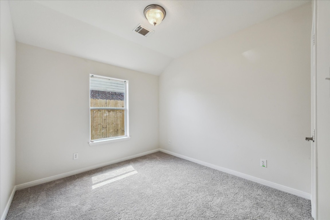 1805 Clover Patch Alvin, TX 77511 - Photo 12 of 14 an empty room with windows