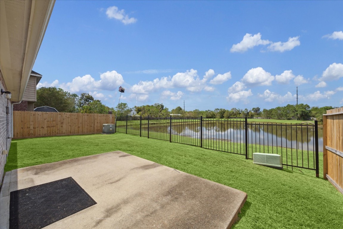 1805 Clover Patch Alvin, TX 77511 - Photo 14 of 14 a view of a golf course with a swimming pool