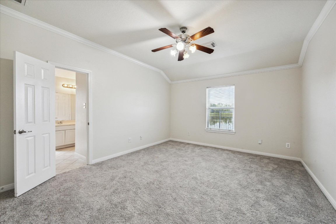 1805 Clover Patch Alvin, TX 77511 - Photo 8 of 14 an empty room with windows and fan