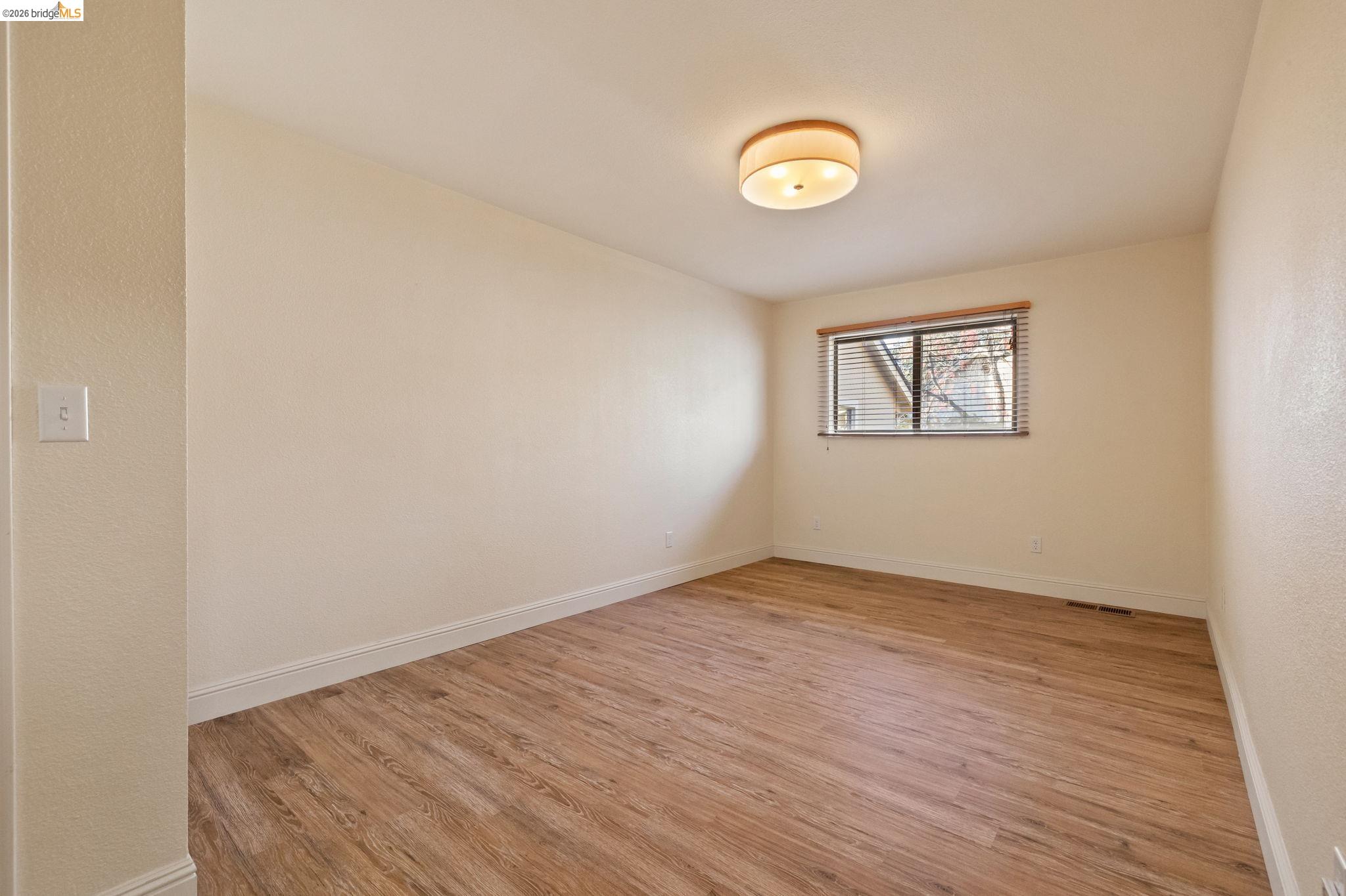 21916 Phoenix Lake Road Sonora, CA 95370 - Photo 31 of 48 an empty room with a window